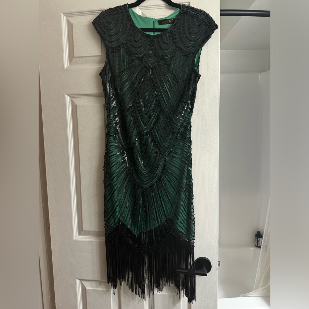 Green and black sequined 1920s style flapper dress